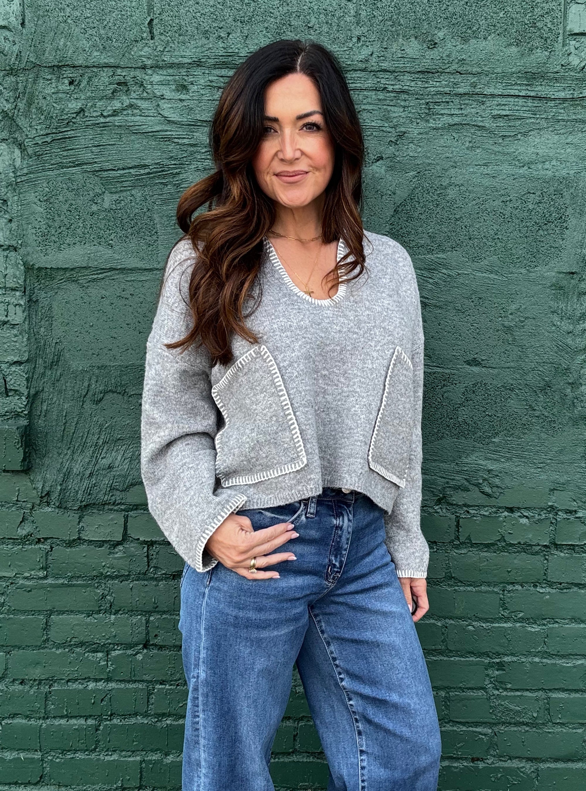 Staying Stitched Together Sweater