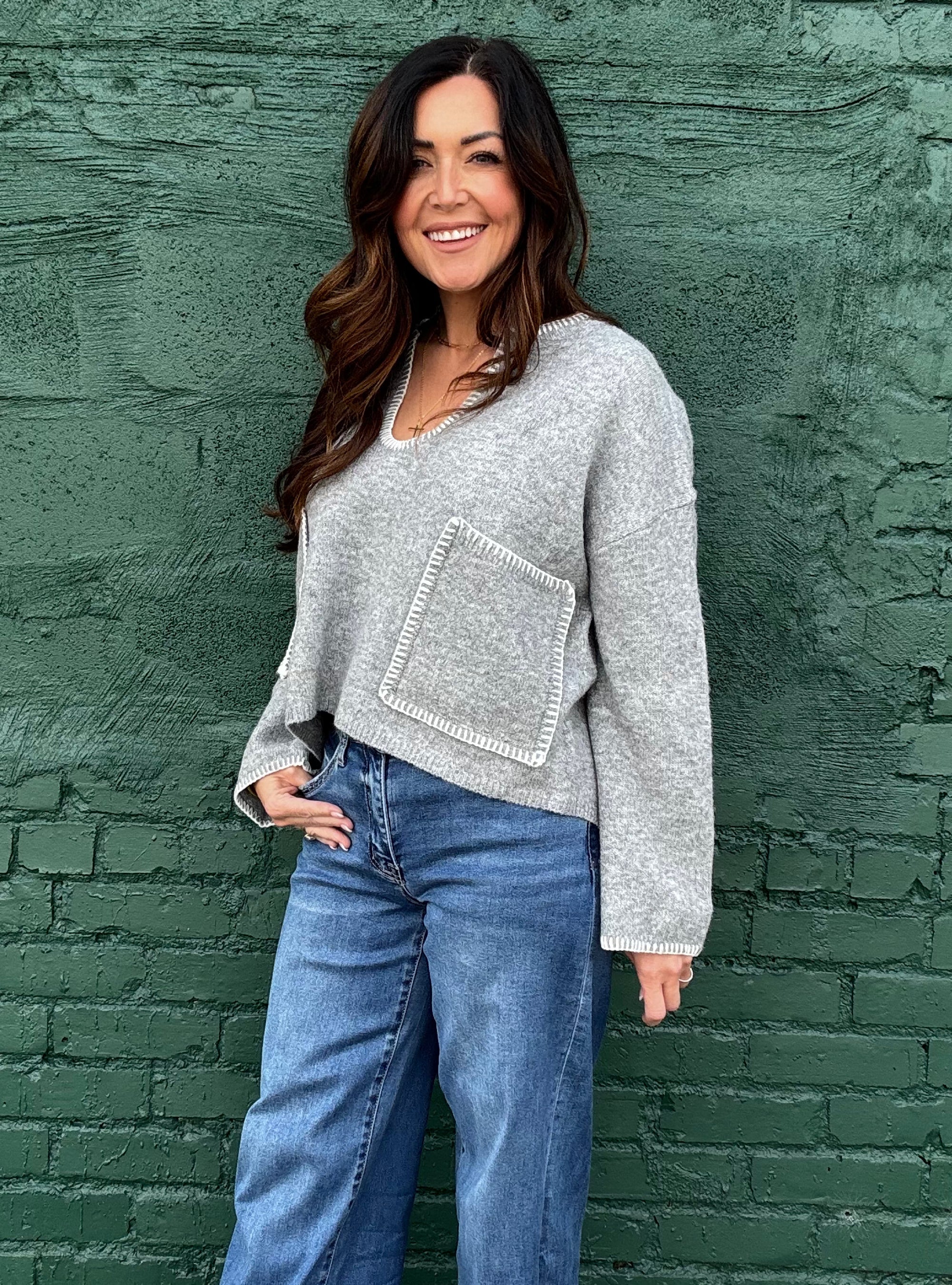 Staying Stitched Together Sweater