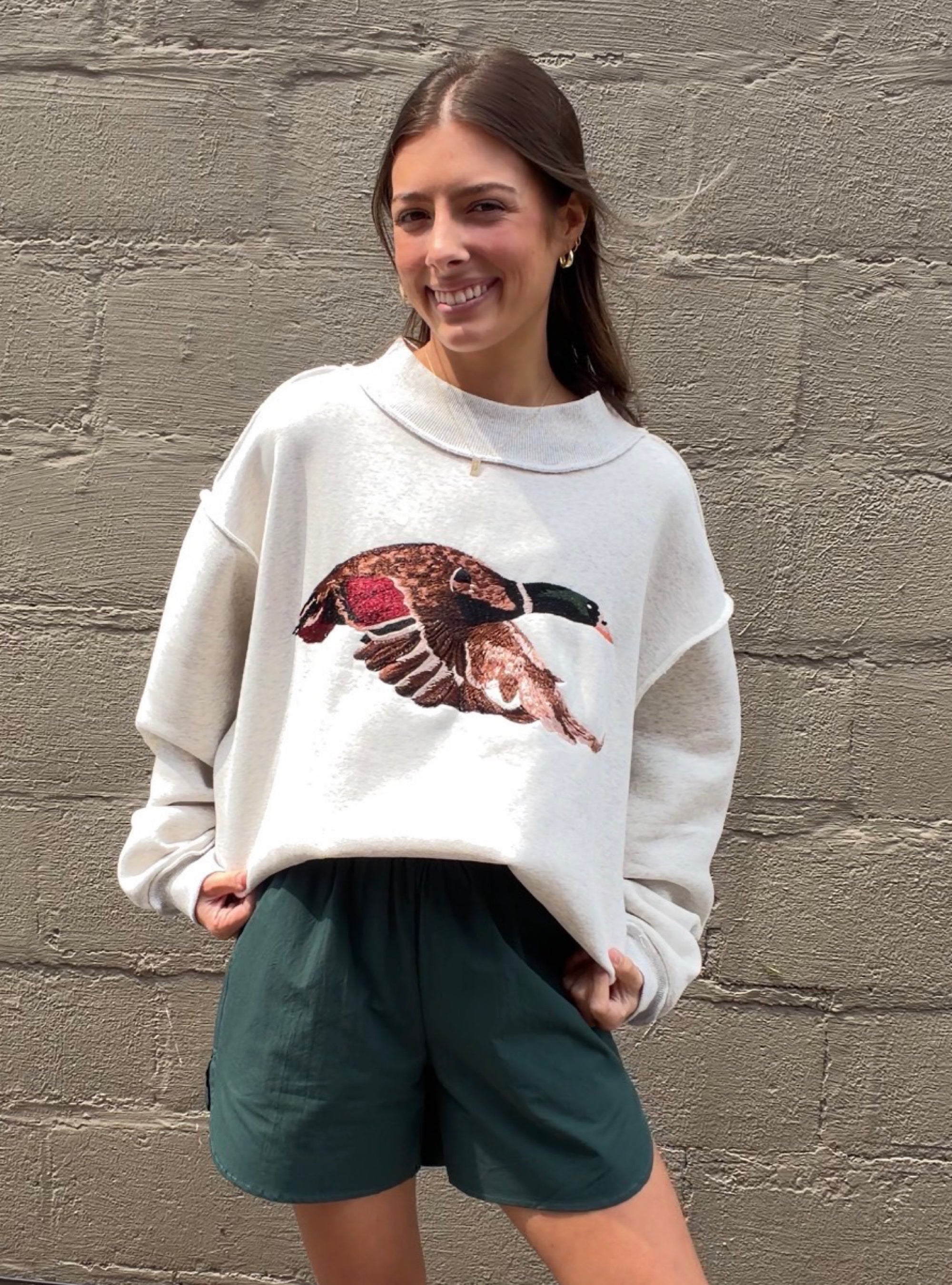 Quackin' Up Over This Cute Sweatshirt